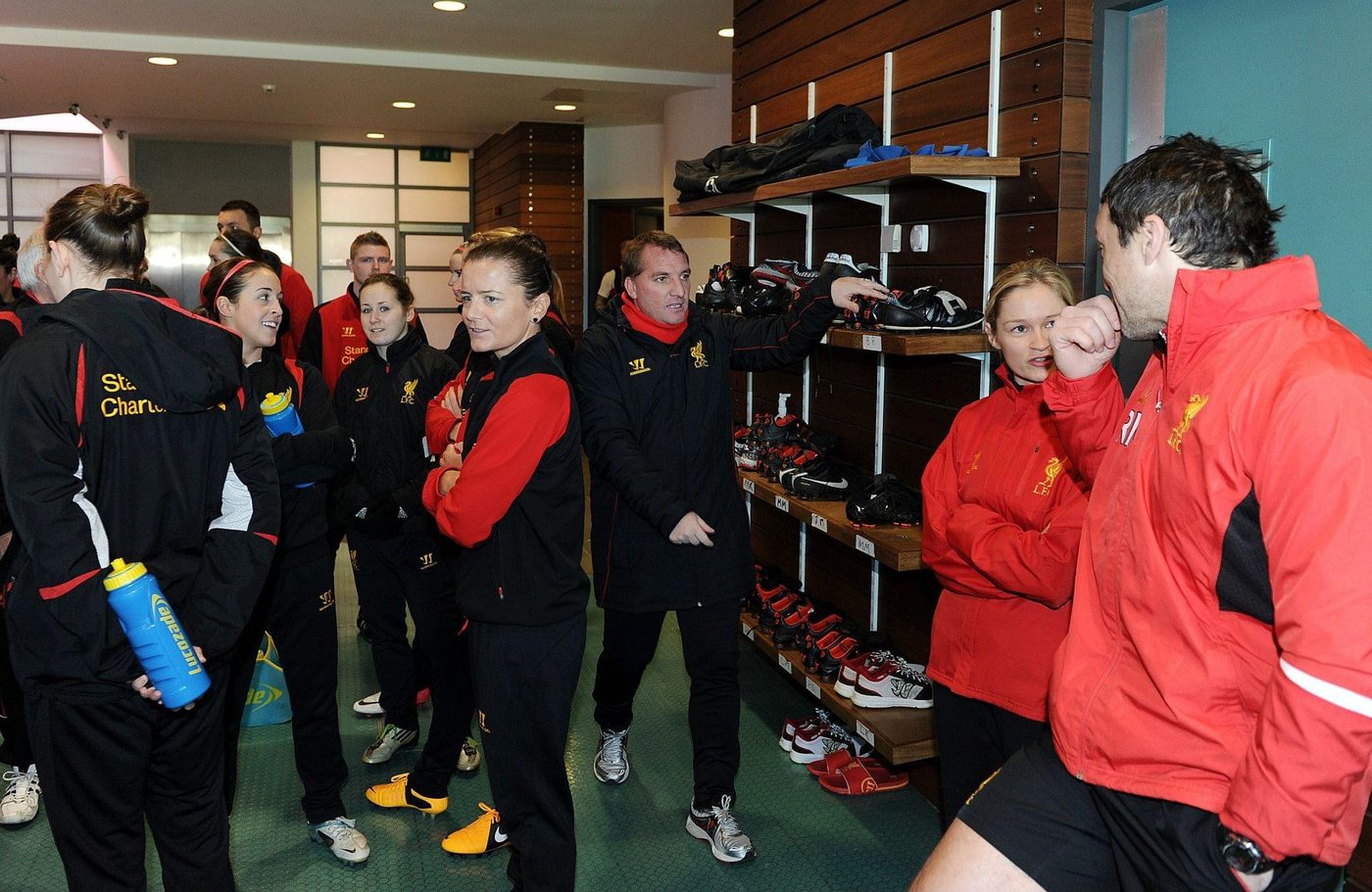 Tess Morris-Paterson working with a Premier League squad in the dressing room